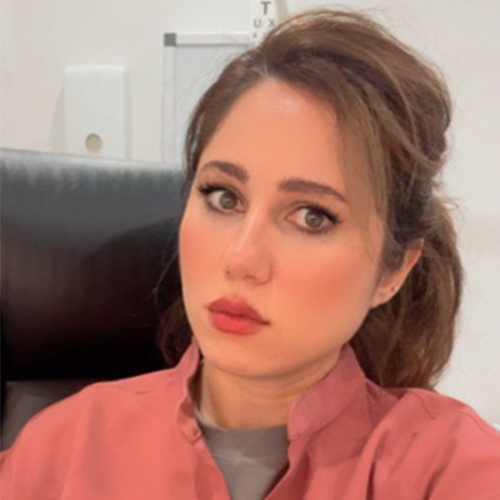 portrait of Dr Saraa Alogaidi, GP and aesthetic medicine specialist, smiling in clinic profile photo